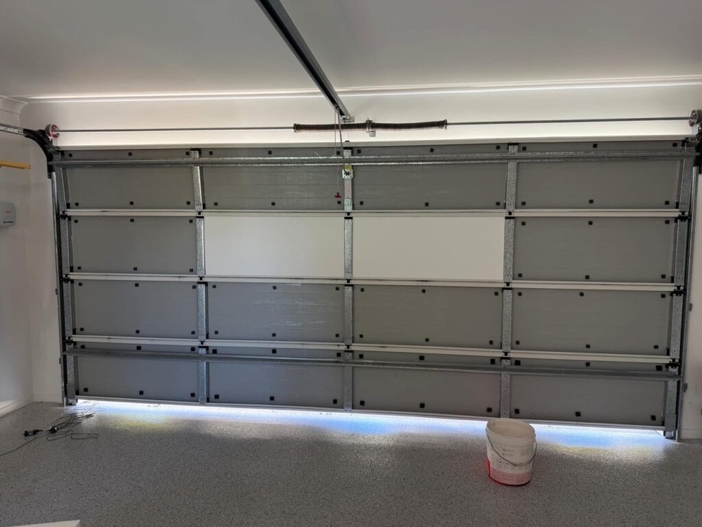 Uninsulated garage door interior before ThermaDoor DIY kit installation