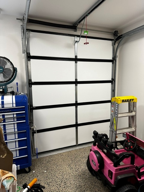 ThermaDoor garage door insulation installed on sectional door — Melbourne builder John Guida, Stronghold Construction